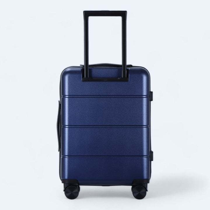 Harde bagageset met cijferslot en wielen, ideaal voor vakantie.