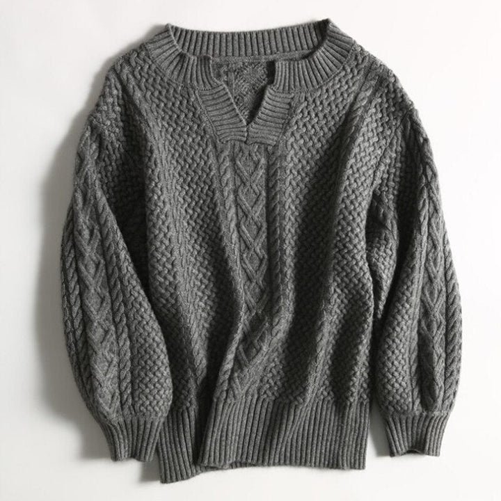 "Ademende wollen trui met uniek kabelpatroon, stijlvolle winterkleding voor dames, verkrijgbaar in diverse kleuren."