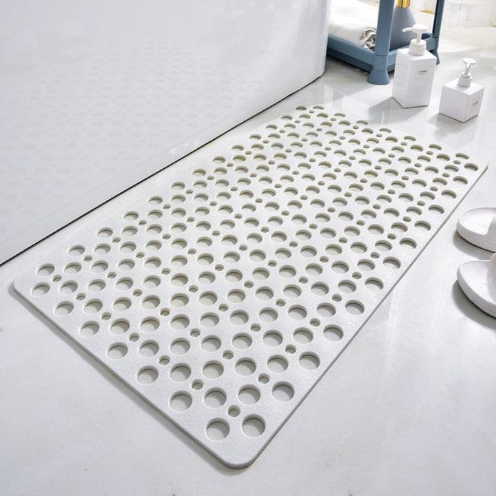 Voorkom uitglijden met deze antislip douchemat; een essentieel badkameraccessoire voor veiligheid en hygiëne.