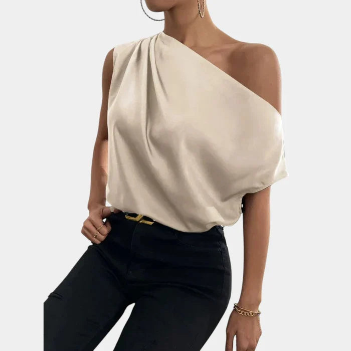 Beige dames off-shoulder top met vleermuismouwen, ideaal voor een stijlvolle en comfortabele zomerlook.