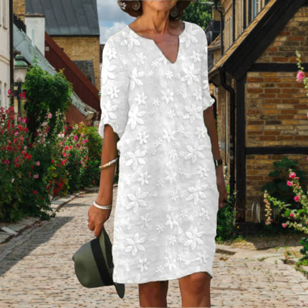 Bloemen zomerjurk met elegante V-hals voor dames, flatterend silhouet en verfijnd bloemenontwerp, perfect voor elke gelegenhe