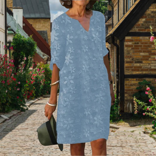 Bloemen zomerjurk met elegante V-hals voor dames, flatterend silhouet en verfijnd bloemenontwerp, perfect voor elke gelegenhe