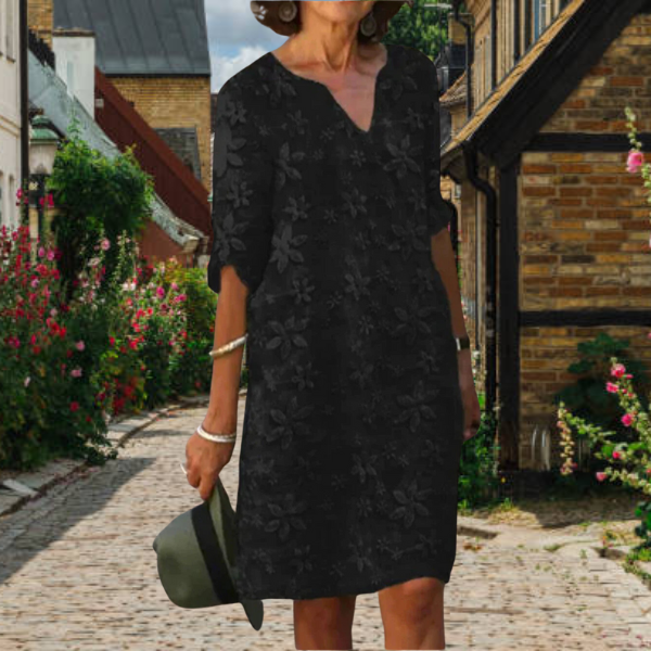 Bloemen zomerjurk met elegante V-hals voor dames, flatterend silhouet en verfijnd bloemenontwerp, perfect voor elke gelegenhe