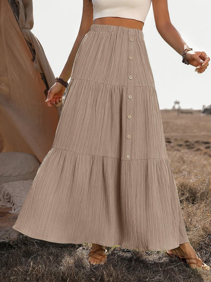 Trendy dames zomer maxi rok met romantische volantlagen, een must-have voor bohemian mode liefhebbers.