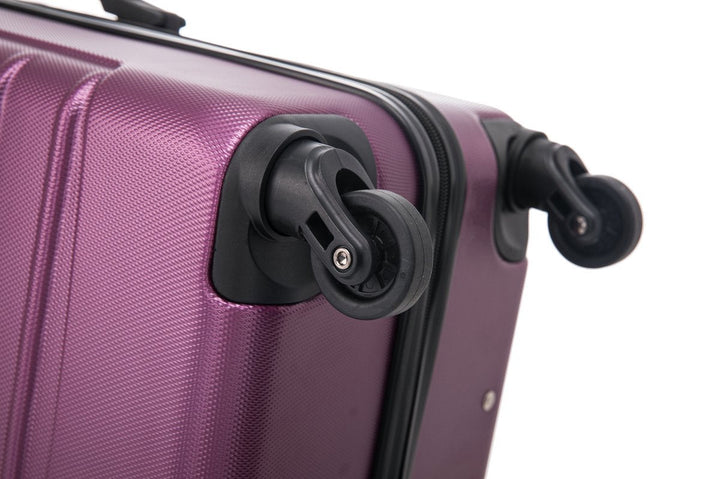 Elegant bordeaux rode hardshell kofferset, robuust en makkelijk te manoeuvreren met 4 wielen.