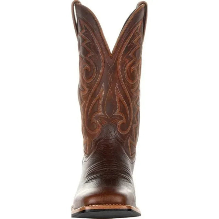"Bruine leren cowboylaarzen heren, westernstijl, mid-kuit, vierkante teen, totempatroon, duurzame PU constructie."