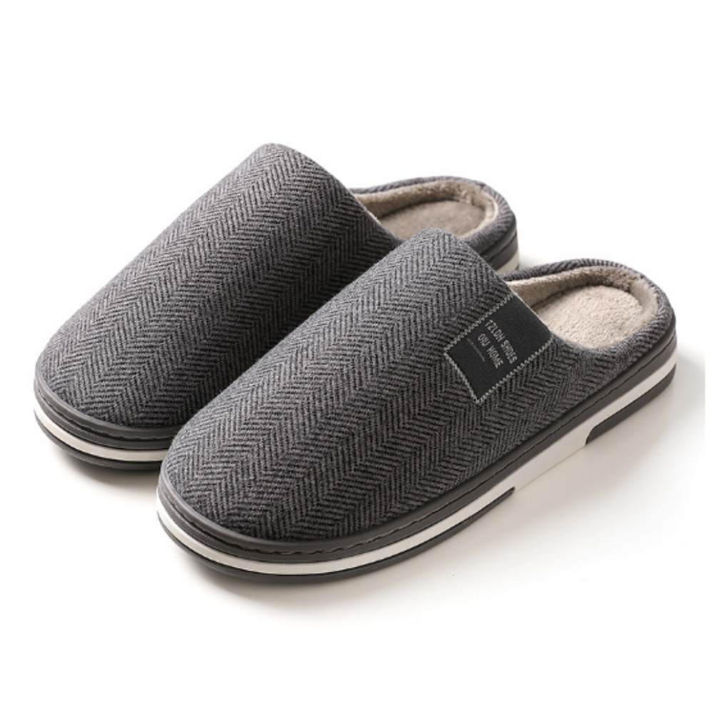 Donkergrijze warme huispantoffels voor unisex, met zachte voering en comfortabele stevige zool. Perfect voor lounge.