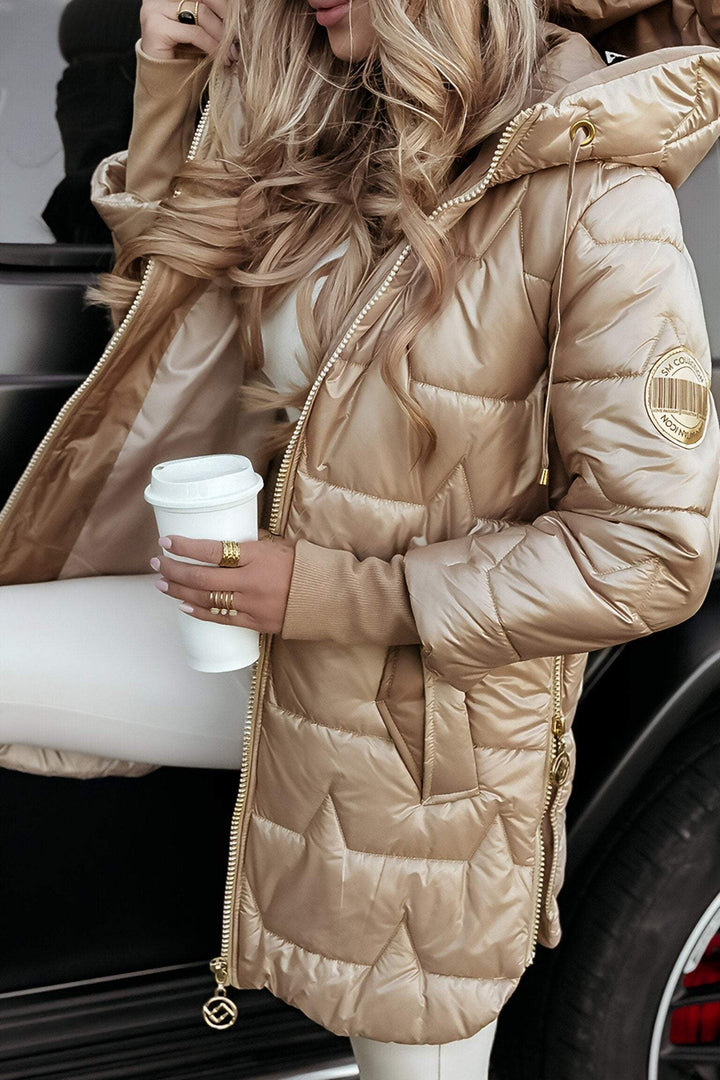 Cédrine dames herfstjas: warm en comfortabel. Stijlvolle capuchonjas voor modebewuste dames in de winter.