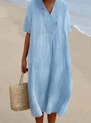 Casual midi zomerjurk voor dames met korte mouwen en ronde hals. Comfortabel en stijlvol voor elke dag.