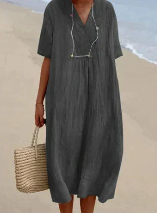 Ademende casual midi zomerjurk voor dames. Zachte, luchtige stof met korte mouwen, perfect voor hete dagen.