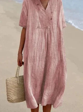 Veelzijdige casual midi zomerjurk voor dames. Modieus en comfortabel met korte mouwen, ideaal voor strand of stad.