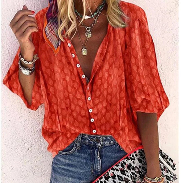 Veelzijdige dames blouse met designer look. Deze moderne top combineert moeiteloze elegantie met dagelijkse draagbaarheid.