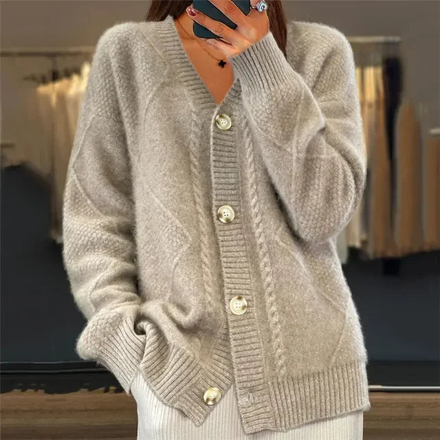 Chique kasjmier vrouwen vest met knoopsluiting, lange mouwen; stijlvol en veelzijdig voor elke gelegenheid.