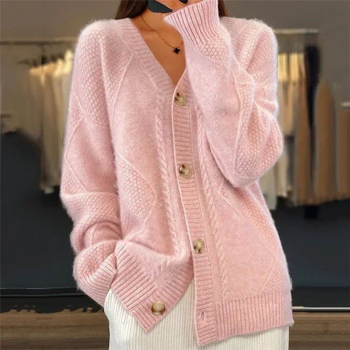 Chique kasjmier vrouwen vest met knoopsluiting, lange mouwen; stijlvol en veelzijdig voor elke gelegenheid.