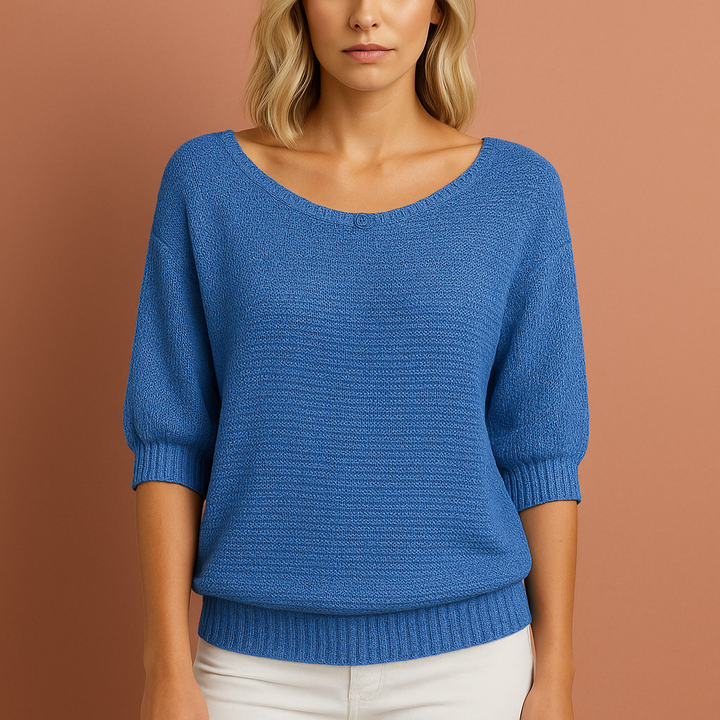 Elegante dames trui met subtiele ruches, warm en comfortabel voor de koudere herfst- en winterdagen.
