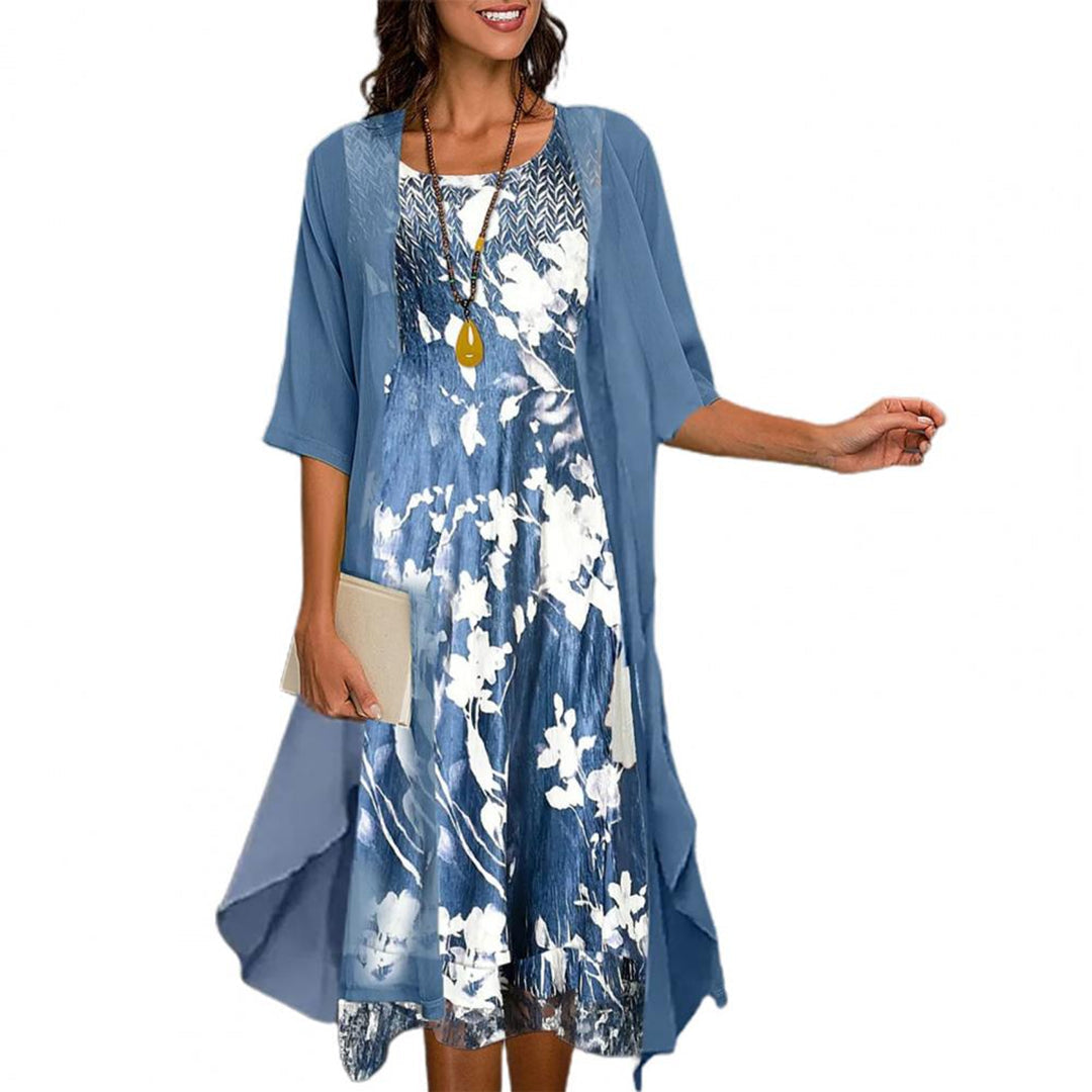 "Comfortabele elastische midi zomerjurk dames in luchtige stof, perfect voor stijl en comfort op warme dagen."