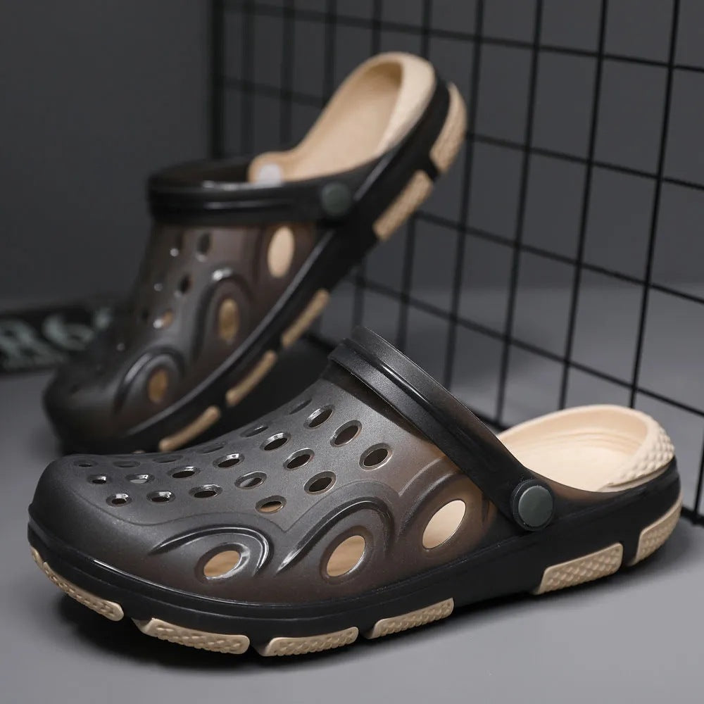 Zwarte herenklompen, ademend en comfortabel, met robuuste antislipzool voor dagelijks gebruik. Casual look.