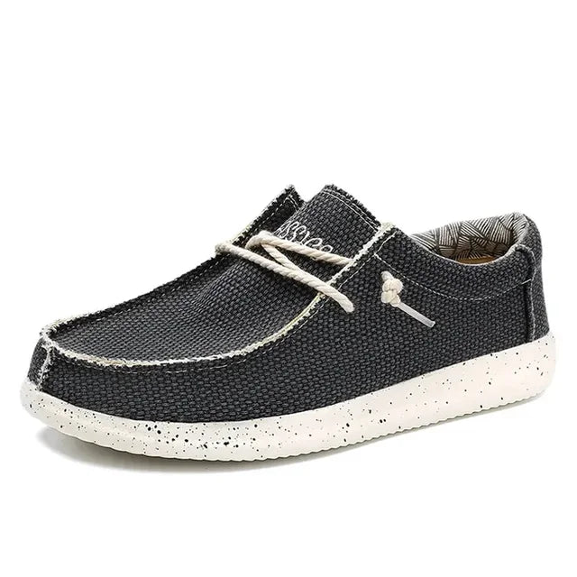 Zwarte ergonomische heren instappers. Nette slip-on schoenen voor optimaal loopcomfort en ondersteuning.