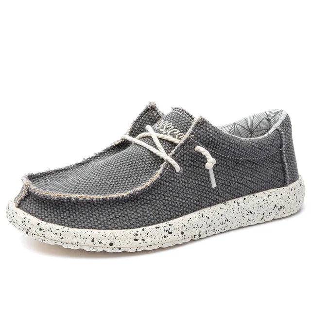 Donkergrijze casual heren instappers. Comfortabele slip-on loafers, ideaal voor dagelijks gebruik en een relaxte look.