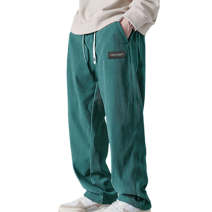 Stijlvolle geribbelde jogger voor heren met wijde pijp en trekkoord; comfortabel en perfect voor vrije tijd.