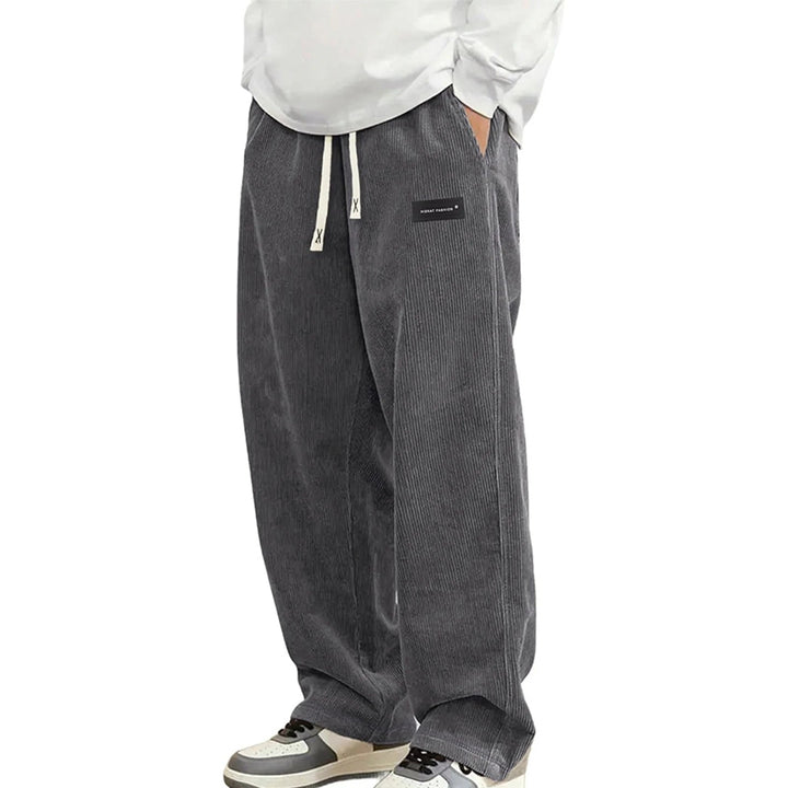 Veelzijdige heren jogger broek met wijde pijp en geribbelde textuur, geschikt voor dagelijks casual comfort.