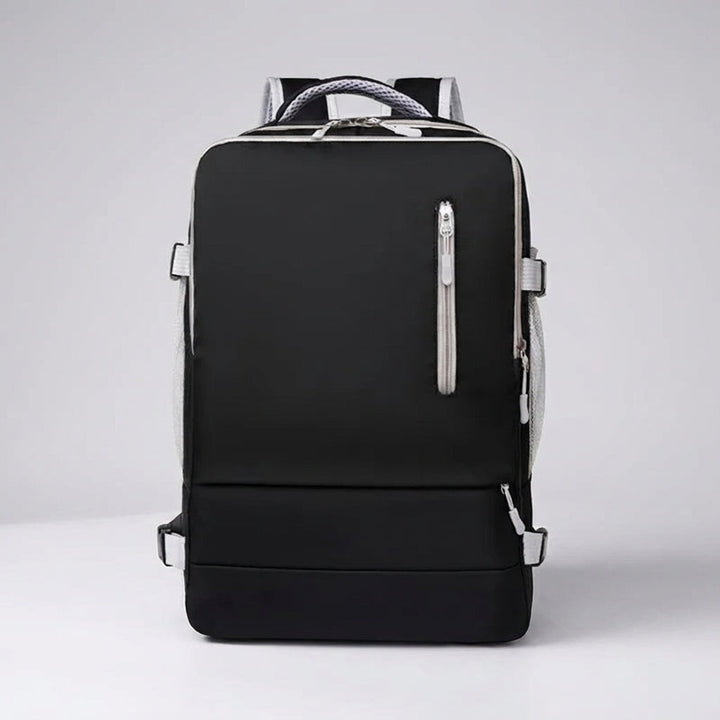 Georganiseerde binnenkant van de Nomadelle anti-diefstal rugzak met apart laptopvak en diverse compartimenten.