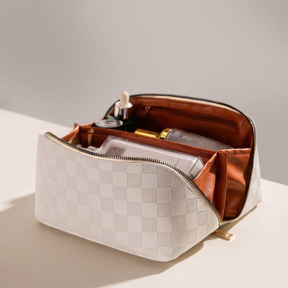 Luxe zwarte cosmeticatas organizer voor dames; ru1me, waterafstotende make-up tas van polyurethaanleer.