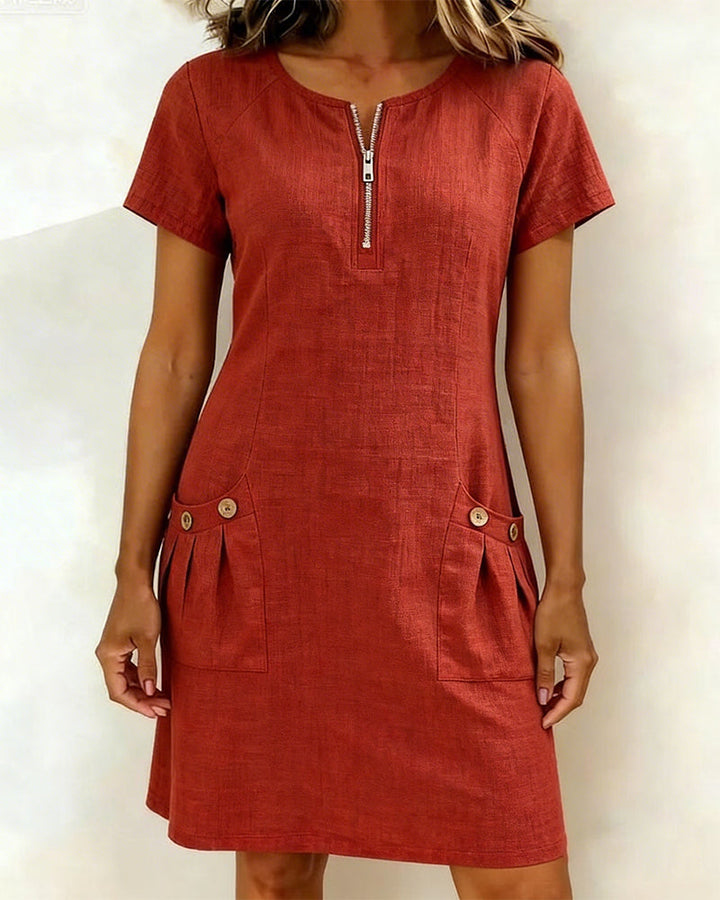 Dames A-lijn zomerjurk met rits en praktische zakken, ideaal voor een casual of elegante look.