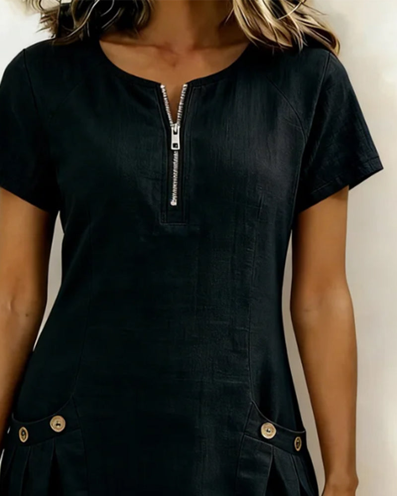 Casual-elegante zomerjurk, A-lijn model met rits, korte mouwen en functionele zakken voor dames.