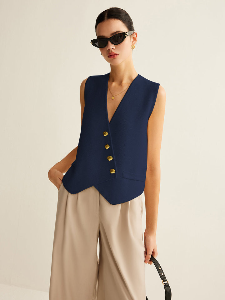 Elegant dames gebreid vest, asymmetrisch design met knopen, perfect voor een veelzijdige en stijlvolle look.