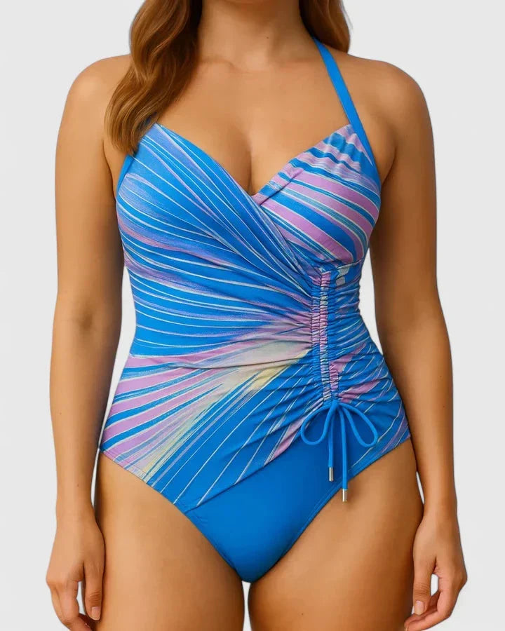Flatterend damesbadpak, V-hals en wrapstijl met ruches en verstelbare bandjes; perfecte strandlook.