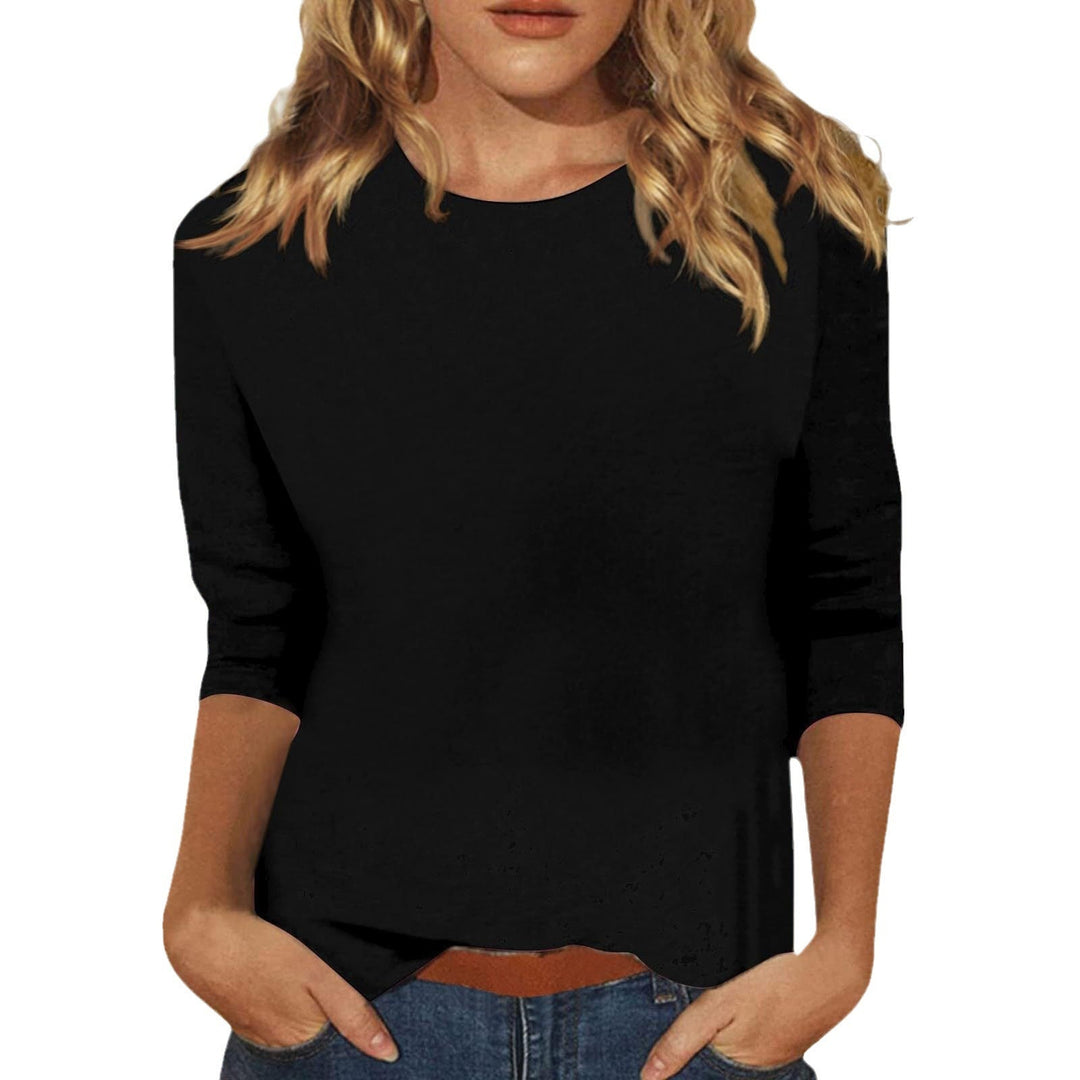 Modieuze top voor dames met 3/4 mouwen, een echte garderobe essentieel.