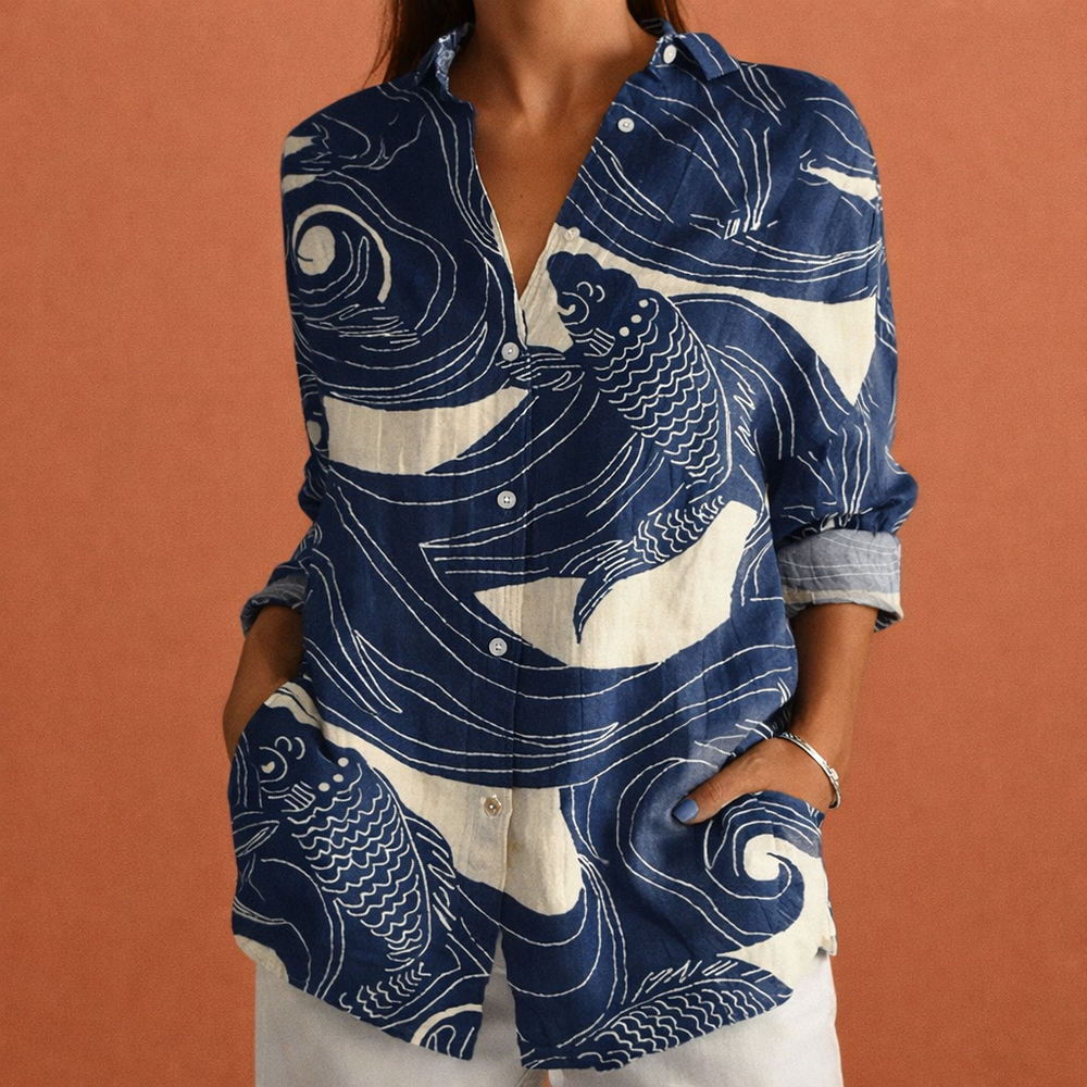Elegante dames blouse met verfijnde bloemenprint, comfortabel en losvallend voor casual of chique.