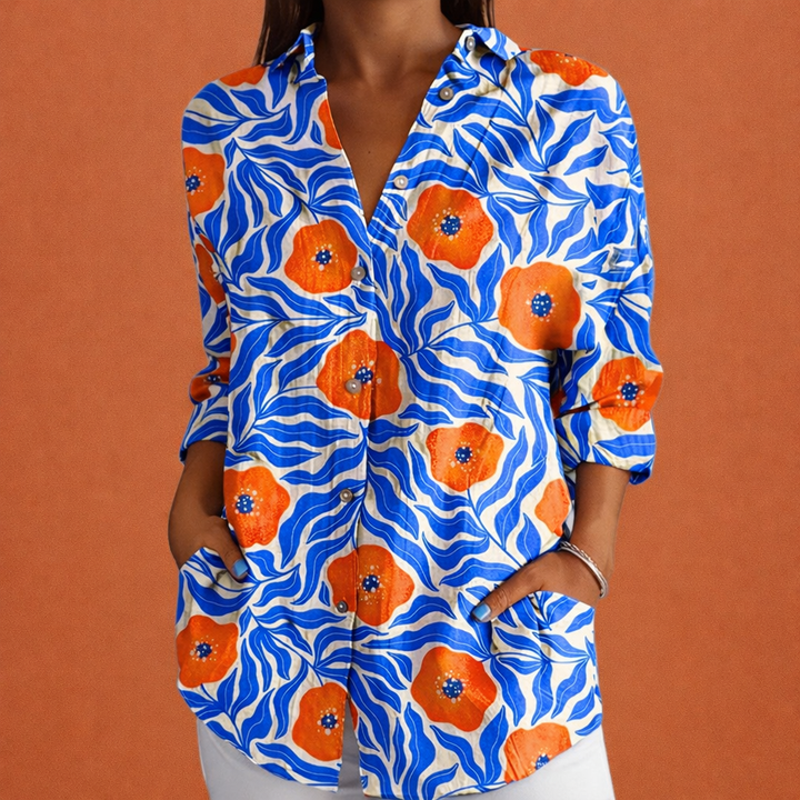 Modieuze bedrukte damesblouse, geschikt voor zowel casual als elegante outfits, met klassieke kraag.