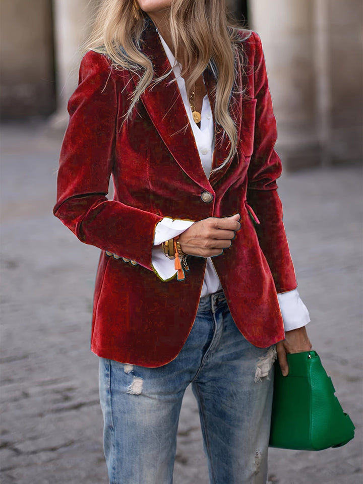 Dames blazer met gouden knopen en getailleerde pasvorm, perfect voor een elegante look.