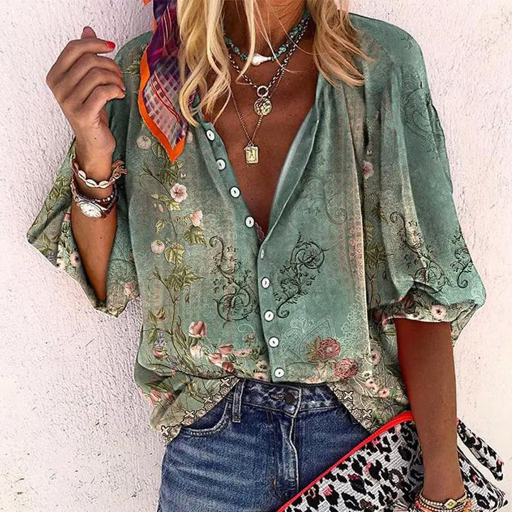 Dames bloemen blouse met knoopsluiting en comfortabele halve mouwen, ideaal voor een casual chique zomerlook.