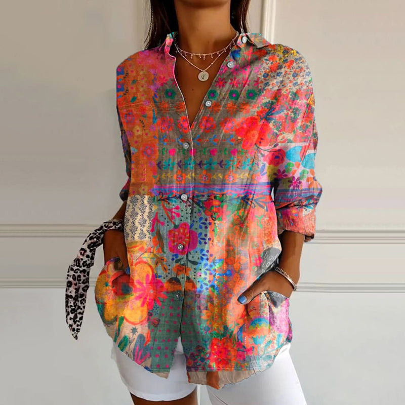"Dames bloemenprint blouse met lange mouwen, elegant button-up ontwerp voor casual en chique gelegenheden."