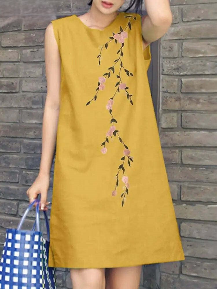 Dames bloemige geborduurde mini jurk in bohemian stijl, perfect voor zomerse dagen. Mouwloos en elegant.