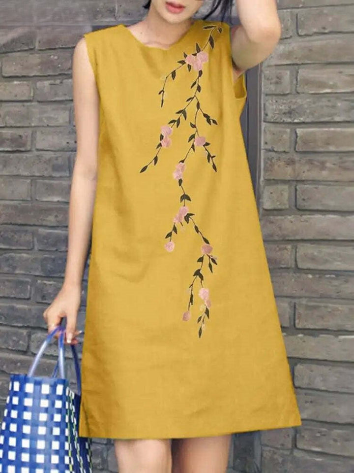 Dames bloemige geborduurde mini jurk in bohemian stijl, perfect voor zomerse dagen. Mouwloos en elegant.