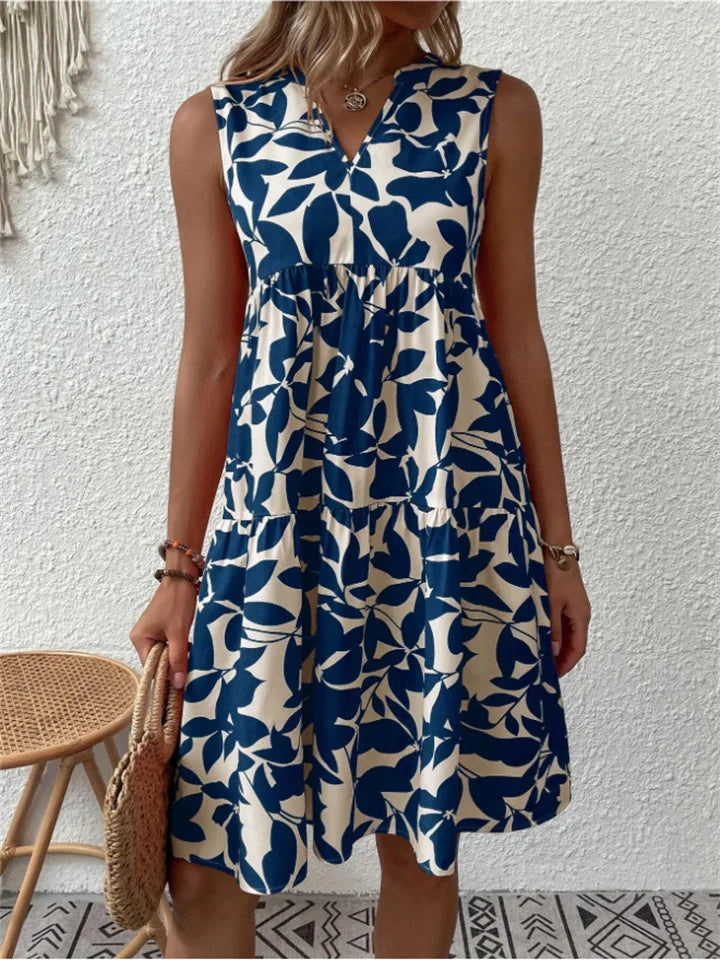 Stijlvolle dames bloemenjurk, midi lengte, ideaal als elegante zomerjurk of luchtige strandjurk.