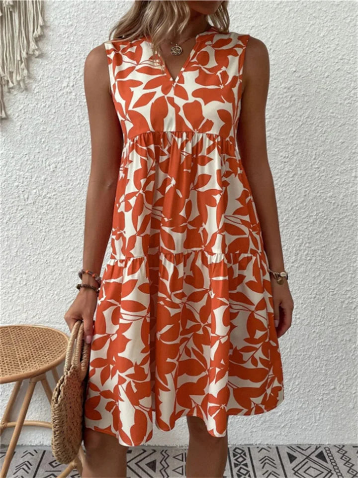 Comfortabele A-lijn midi jurk voor dames, met bloemig patroon, geschikt voor zomer en lente.