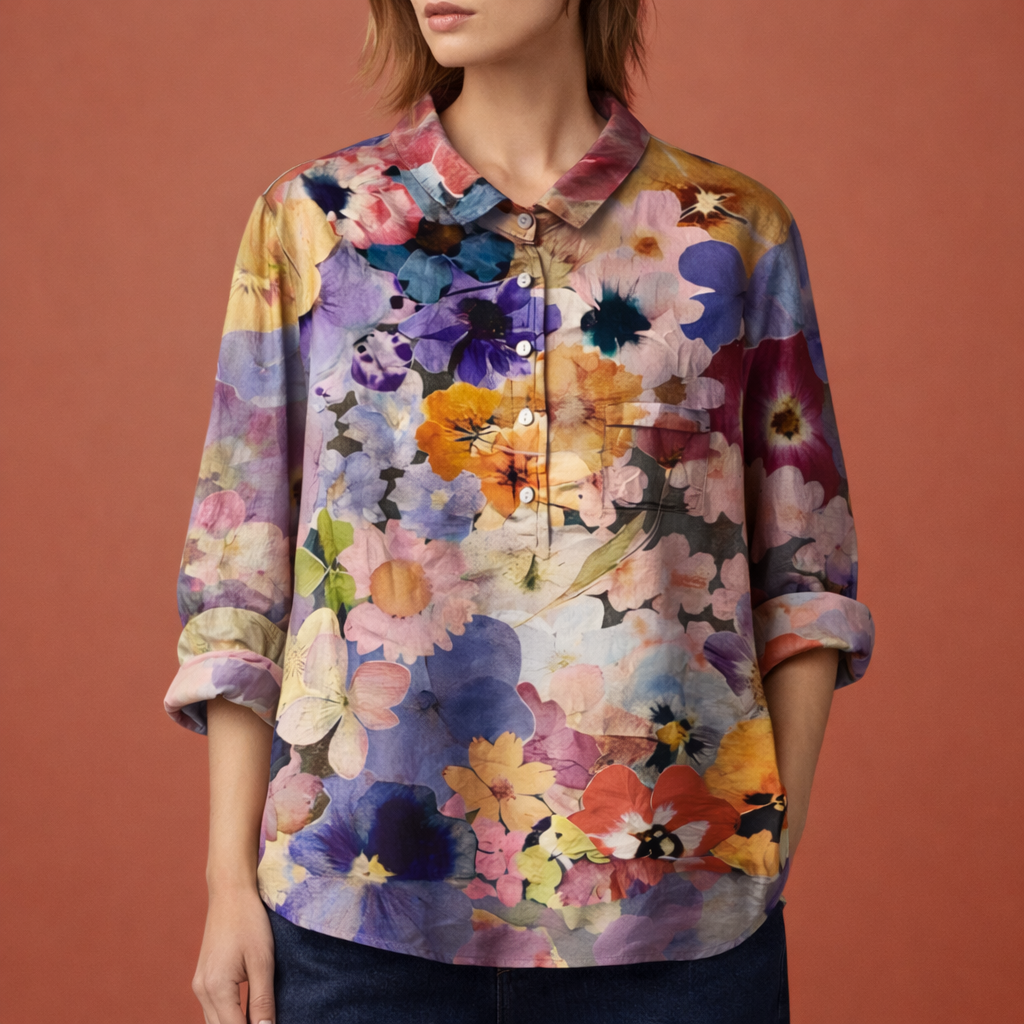 Elegante dames bloemenprint blouse met lange mouwen en kraag, geschikt voor zakelijke en casual settings.