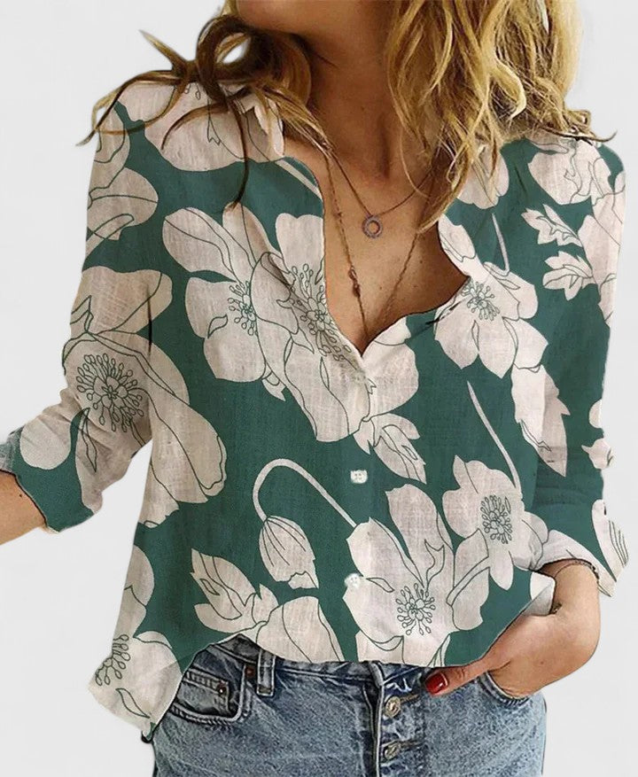 Moderne dames blouse met golvende revers, lange mouwen en functionele knoopsluiting. Diverse kleuren, relaxed fit.