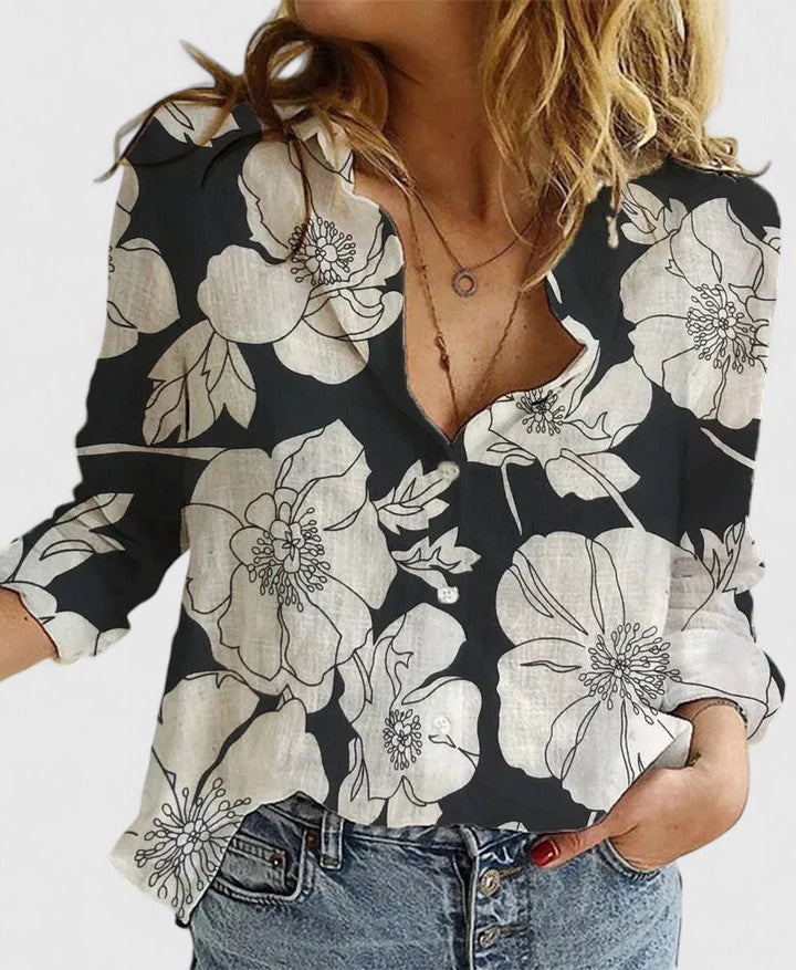 Comfortabele en elegante dames blouse met golvende revers, lange mouwen en knoopsluiting. Perfect voor kantoor.