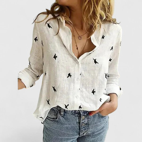 Stijlvolle casual dames blouse met golvende revers, lange mouwen en knoopsluiting. Modieus en veelzijdig.