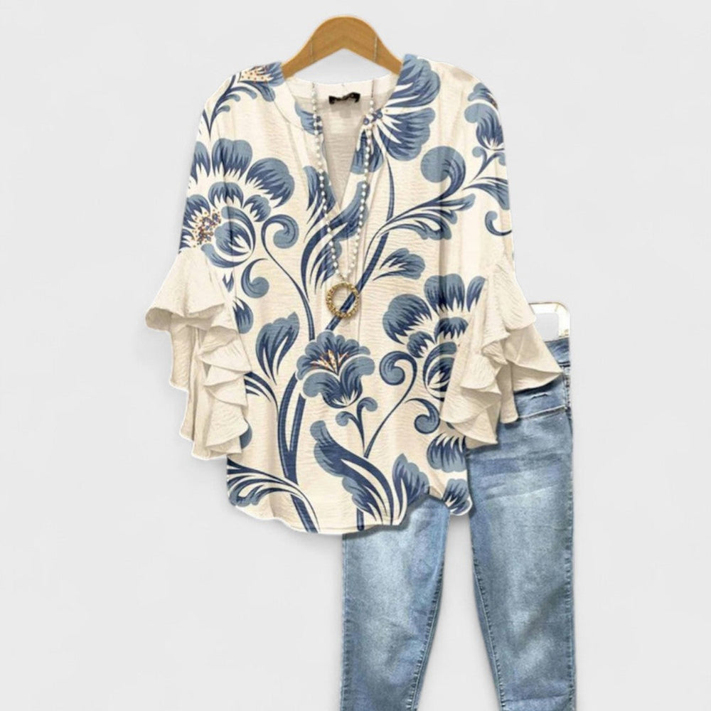 Casual oversized damesblouse met V-hals en 3/4 volantmouwen, ideaal voor de zomer.