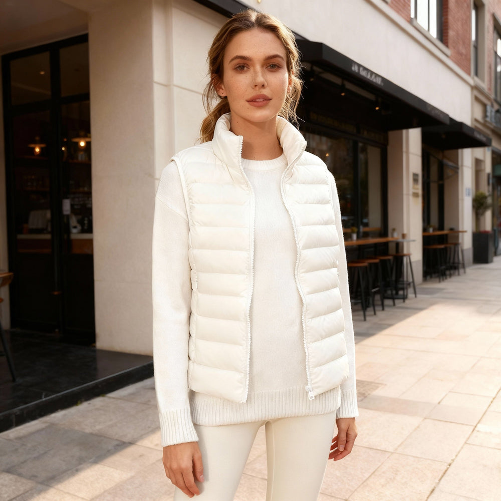 Stijlvolle dames bodywarmer, perfect voor een elegante laagjes look. Hoge kraag & slank design.