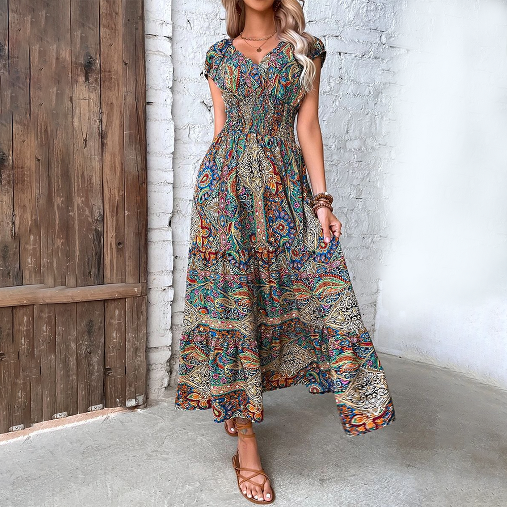 Elegante lange dames zomerjurk met comfortabele boho-stijl en vloeiende pasvorm.