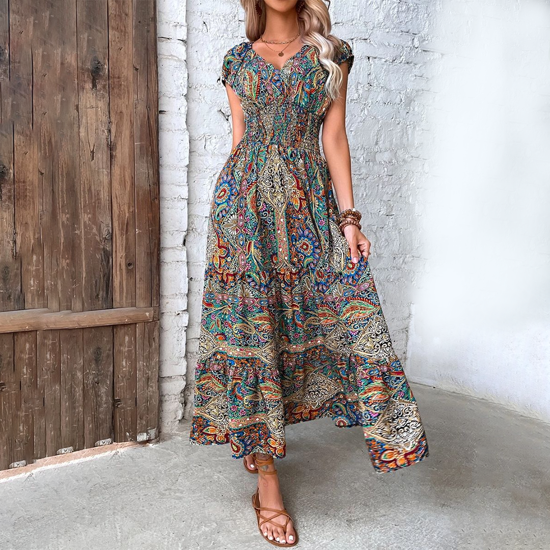 Elegante lange dames zomerjurk met comfortabele boho-stijl en vloeiende pasvorm.