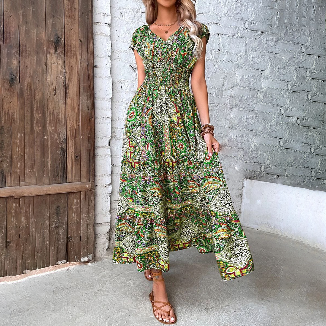 Trendy dames boho maxi jurk met losse, vloeiende pasvorm, geschikt voor diverse zomerse looks.